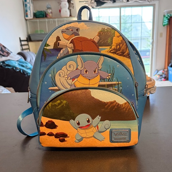 Loungefly Other - Loungefly Blue Pokémon Squirtle Evolution Mini Backpack